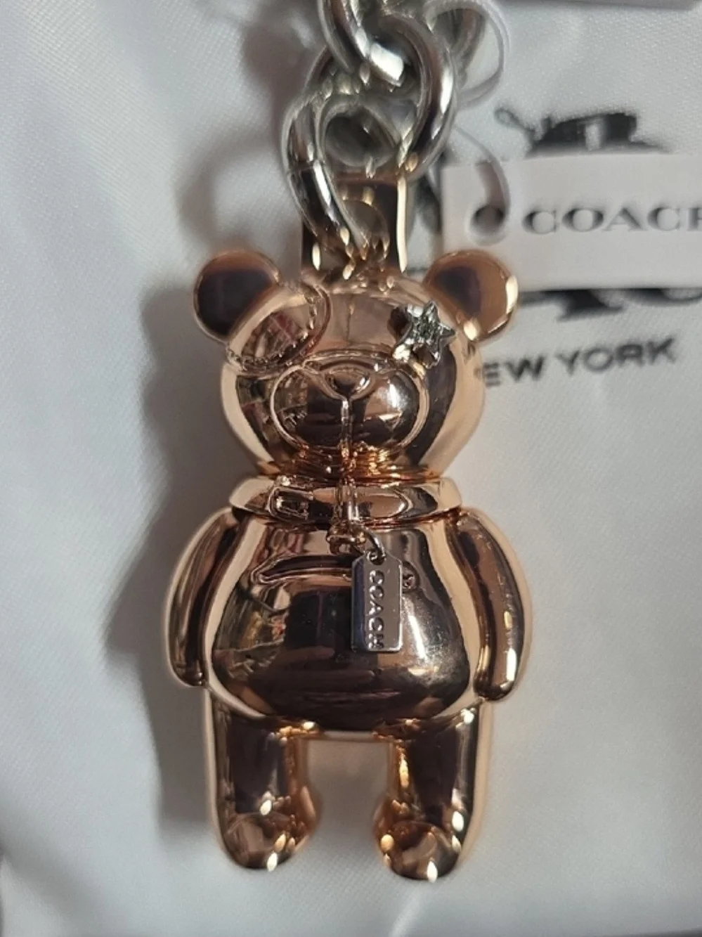 The official Rose Gold Coach 3D Mascot Bear Bag Charm & Keychain
